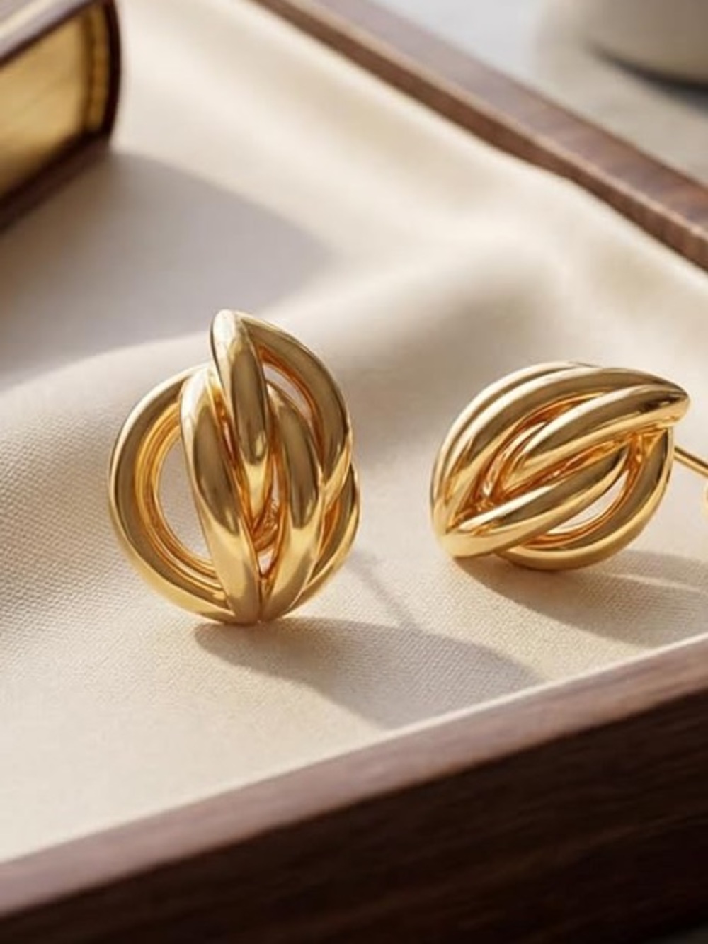 Anthropologie Polished Gold Tone Loop Knot Stud Earrings